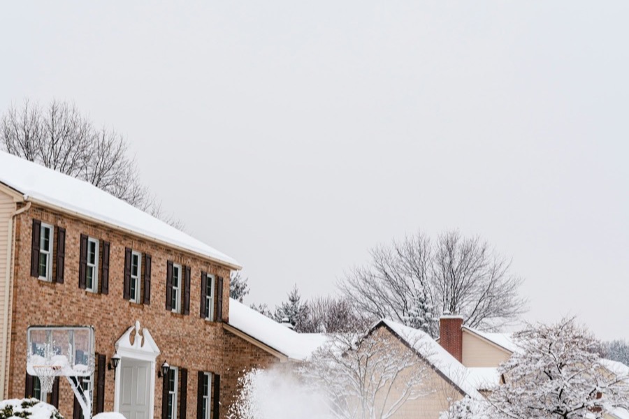 Snow-covered residential houses